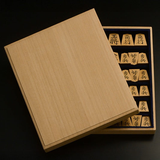 Pièces de shogi sculptées – Buis de Mikurajima – Kinryū – Œuvre de Shūraku (pièce unique)