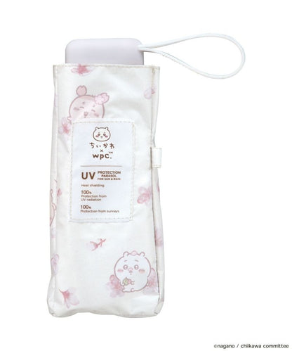 Ombrelle pliable Chiikawa × Wpc. – Parasol kawaii UV 100 %, pliant, pluie & soleil (édition sakura)