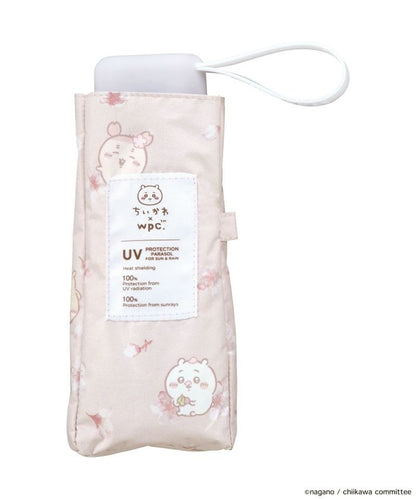 Ombrelle pliable Chiikawa × Wpc. – Parasol kawaii UV 100 %, pliant, pluie & soleil (édition sakura)
