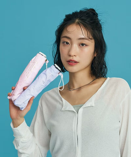 Ombrelle pliante Wpc. Hanayura Mini 50 cm – Ultra-légère 116–118 g, UV 99,9 %