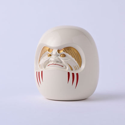 Daruma japonais porte-bonheur en métal laqué Ginzado | Objet décoratif traditionnel du Japon
