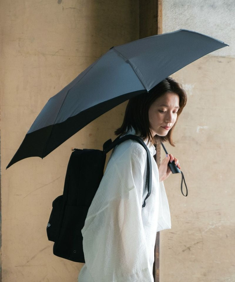 Parapluie pliable protège-sac à dos – Wpc. Back Protect | Pluie & Soleil