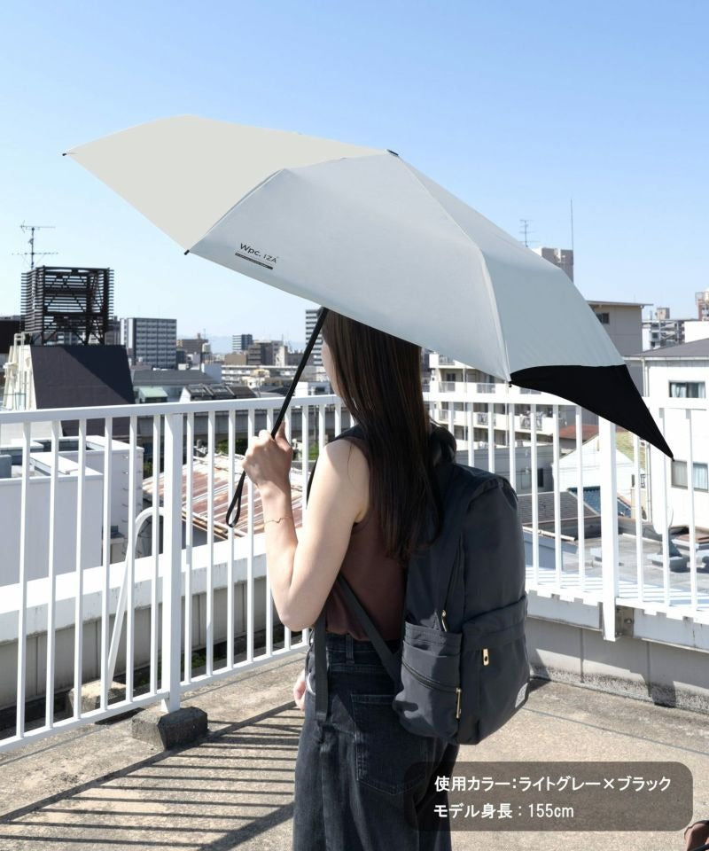 Ombrelle pliable Wpc. IZA Backpack Guard – Parasol UV 100 % protégeant le sac à dos, pluie & soleil