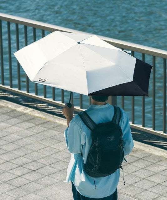 Sombrilla plegable WPC. Protector de mochila IZA: protección solar 100 % UV que protege tu mochila de la lluvia y el sol.